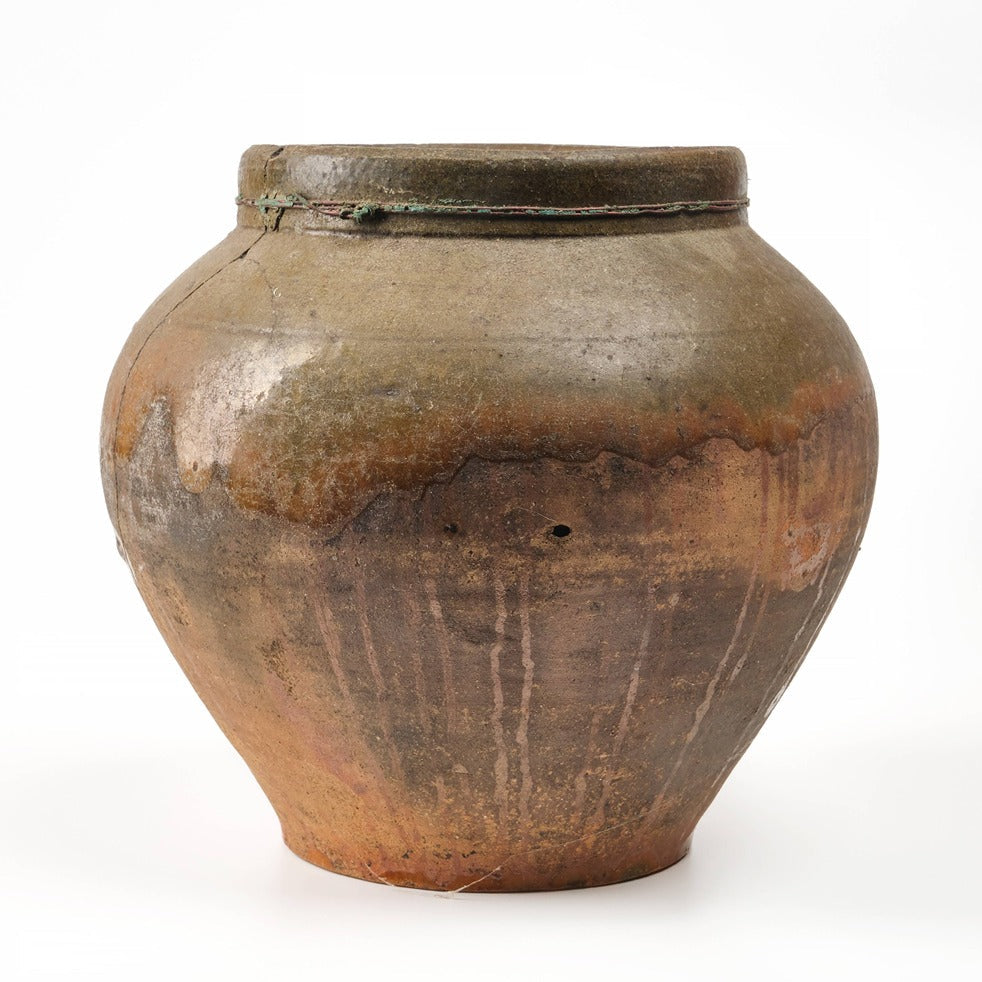 Antique brown clay pot